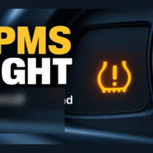 TPMS light warning symbol on a car dashboard showing a tire pressure problem